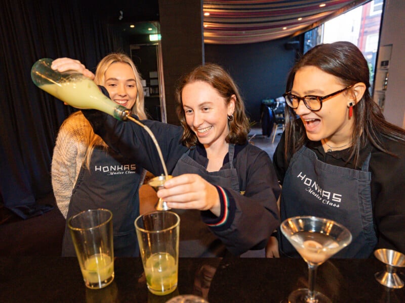 A group of friends having fun at a cocktail class